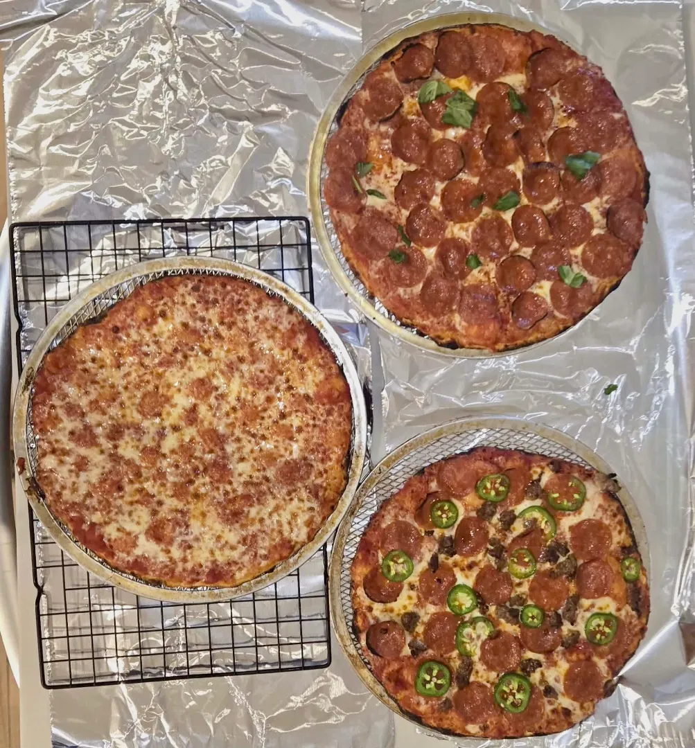 Three A Pizza Love pizzas cooling after baking